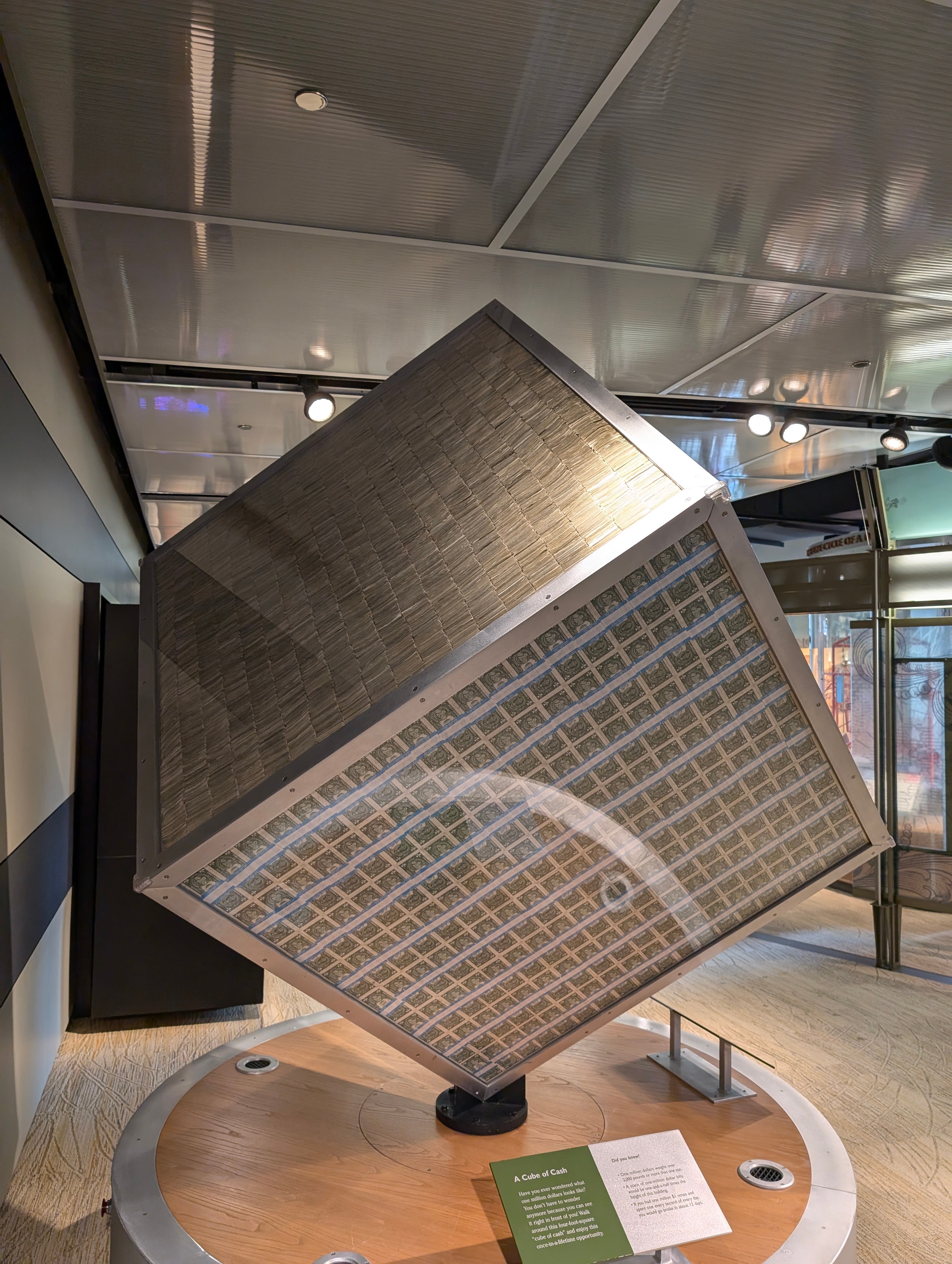 A large transparent cube filled with stacks of $1 bills is displayed at the Federal Reserve Bank of Chicago's Money Museum.